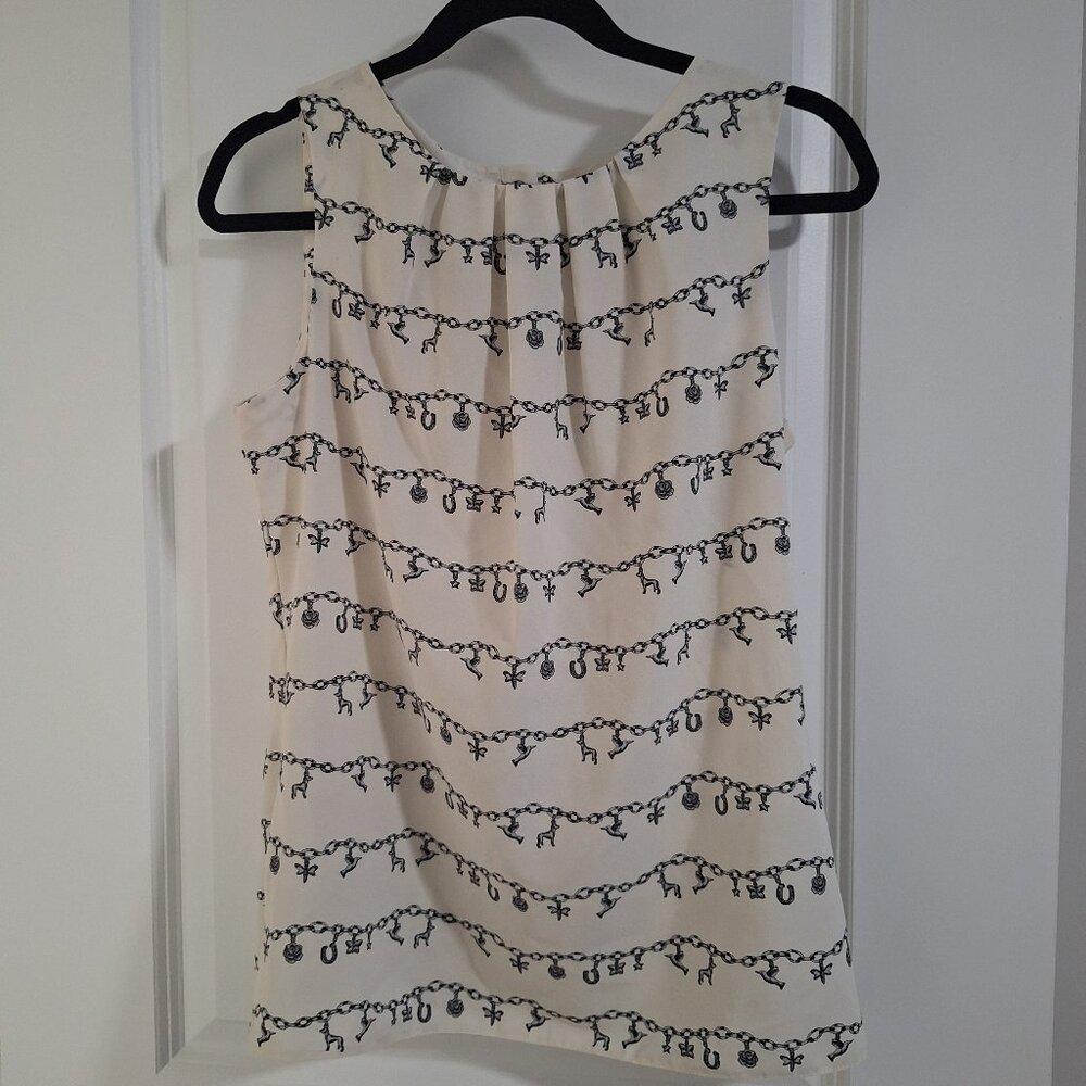 Black and white lucky charm bracelet pattern sleeveless blouse with buttons us 6